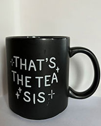 a black mug with the quote 'that's the tea sis'